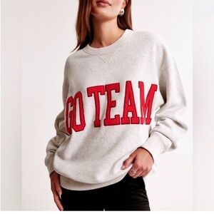 Abercrombie & Fitch Light Gray Sweatshirt with Red Lettering